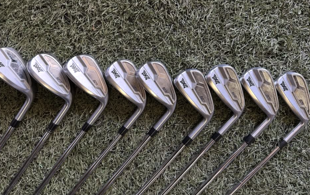 PXG iron set lined up on turf