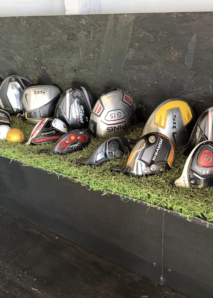 Drivers and woods displayed inside the shop