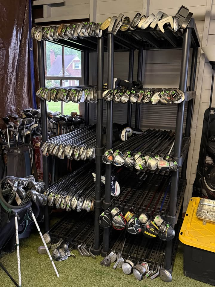 Wall of clubs at BackNine Golf Co. shop